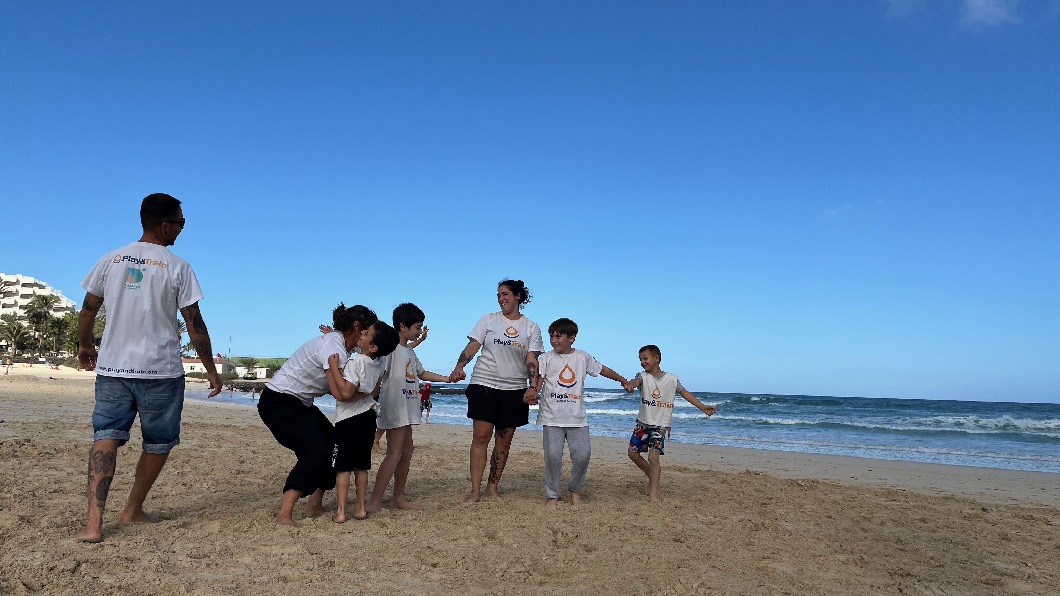 chilfren doing an activity at the beach