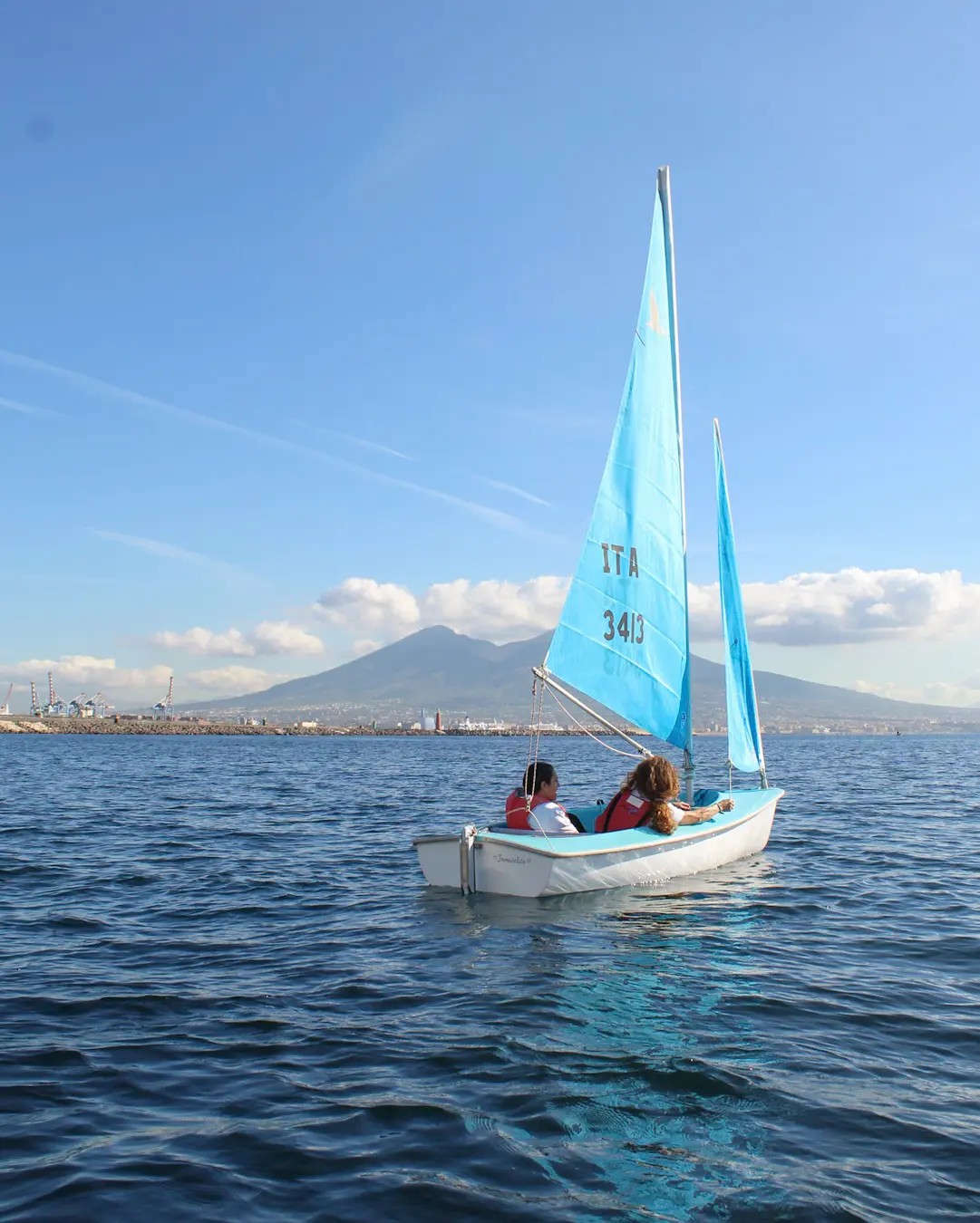 sailing in the gulf of Naples with the view of the volcano