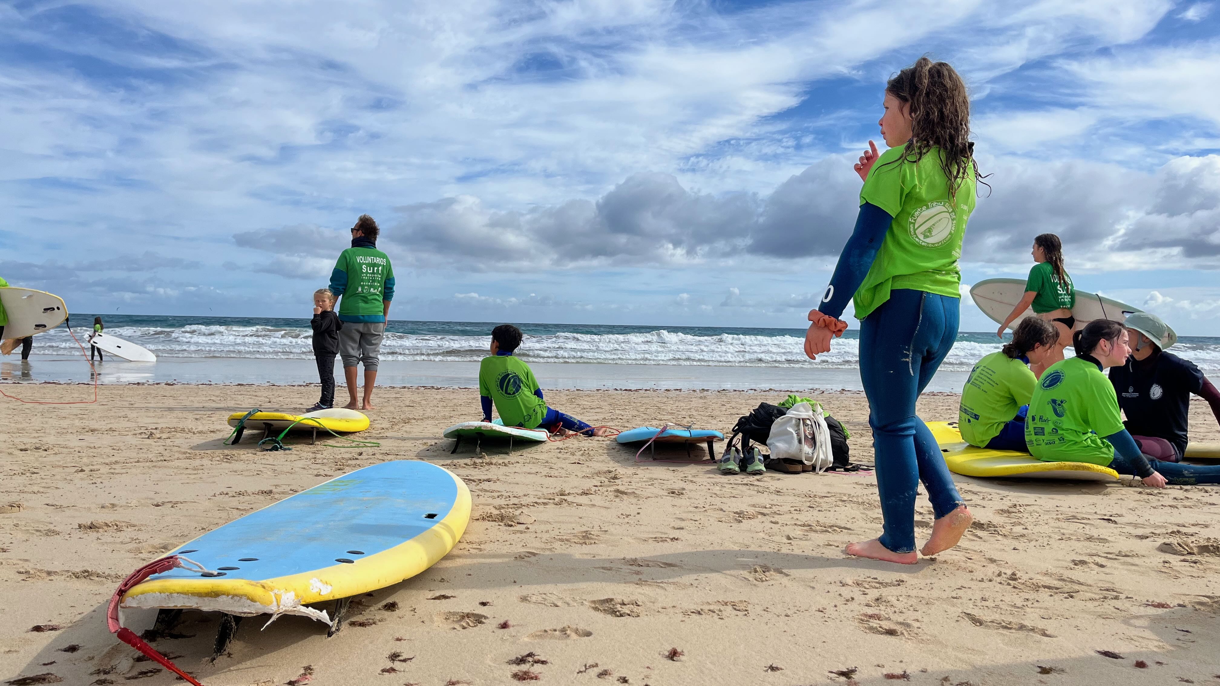 surfing at the beach with Fuerte Tribu