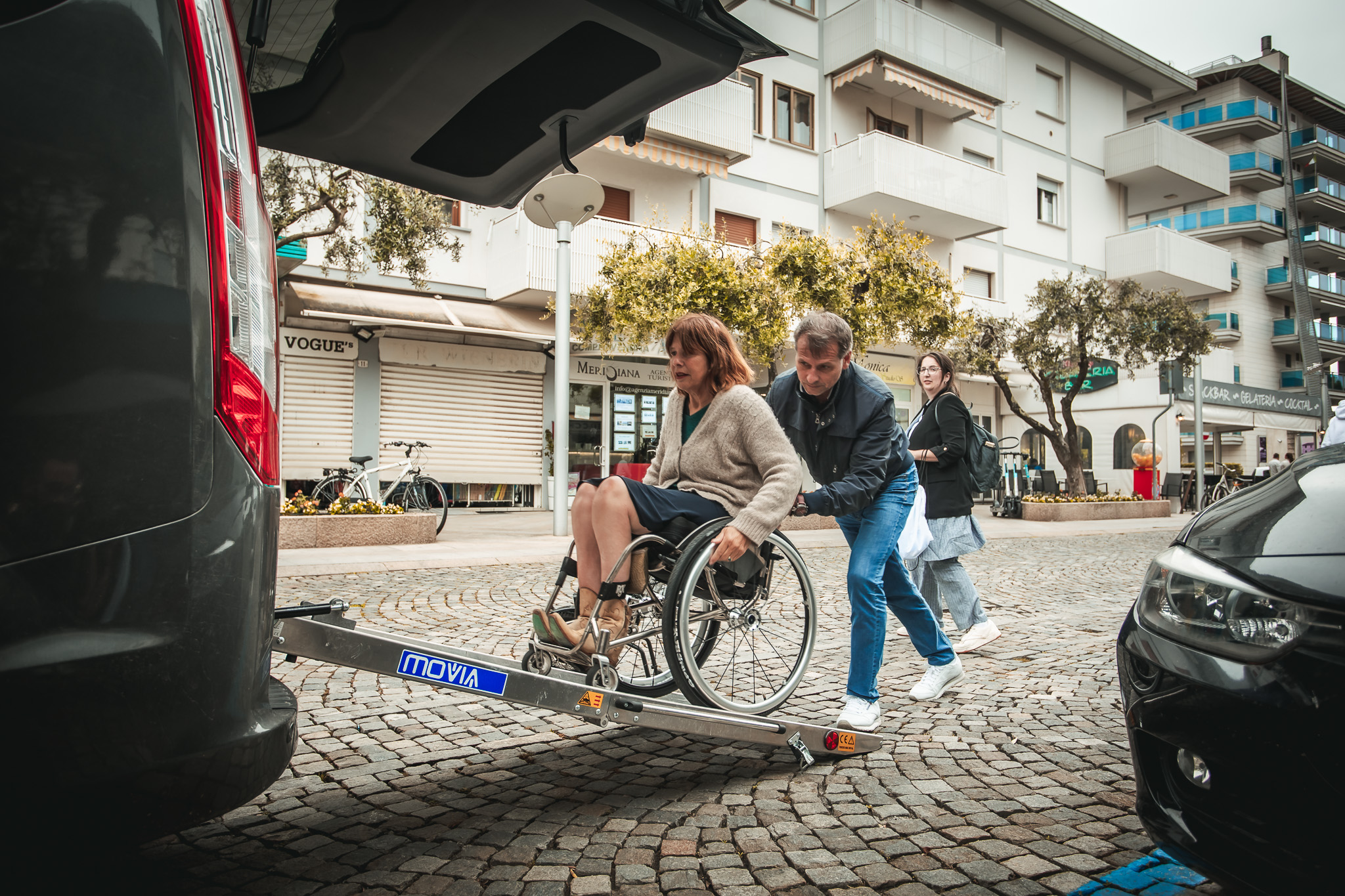 Boarding the wheelchair accessible van with the ramp