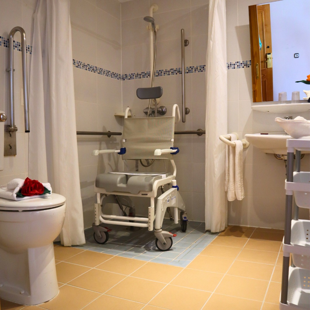 Shower with chair commode